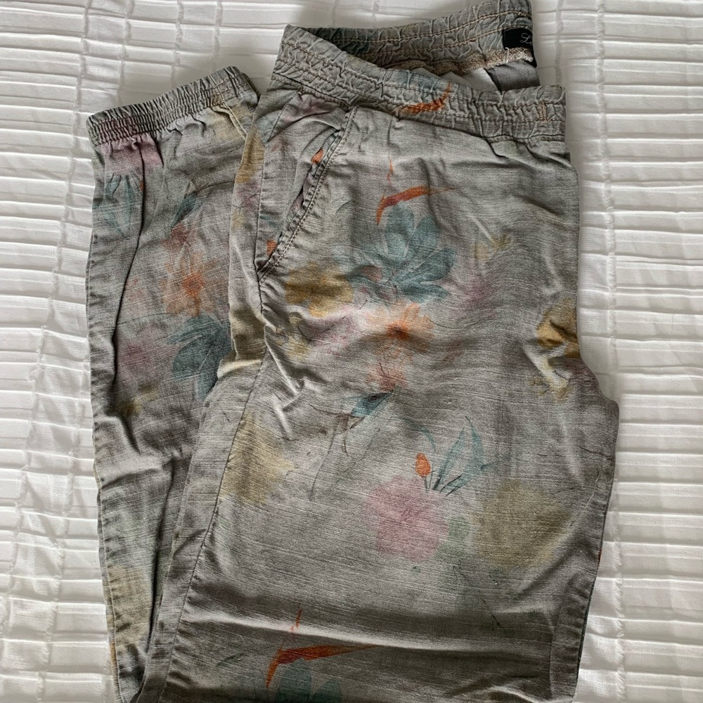 Level 99 Gray Pants with Subtle Pastel Floral Accents